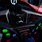 MOZA RACING R12 Wheel Base close up mounted to a racing cockpit